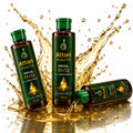 Three bottles of Attari Herbal Oil in dark green and amber packaging are arranged dynamically with a dramatic golden oil splash and droplets on a white background.